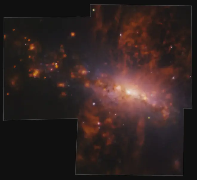 Taken with ESO’s Very Large Telescope, this picture captures the galaxy NGC 4383 evolving in a strange way. Gas is flowing from its core at a staggering rate, hurtling from the galaxy at average speeds over 200 km/s. This mysterious gas eruption has a unique cause: star formation.