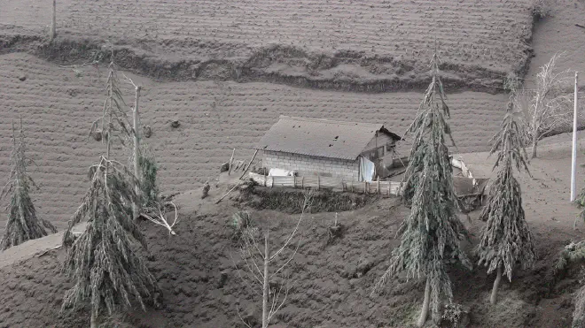 Ashfall from Tungurahua volcano in Ecuador covers nearby farms in 2006. Credit: P. Ramon, USGS