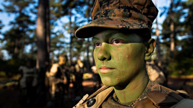 The photo shows the first American female infantry soldier, Christina Fuentes Montenegro. The photo is one of 26,000 images that the Pentagon has flagged for deletion from the websites of the US military as it doesn’t align with the views of the Trump administration. Image credit: Alamy