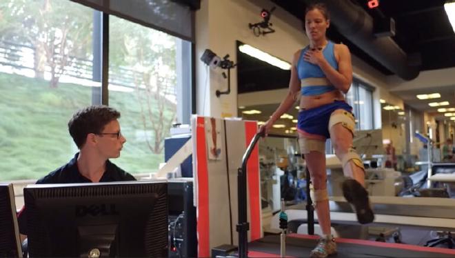 Lead researcher Scott Uhlrich measures a participant’s gait. At the beginning of the study, participants received a baseline MRI and walked on a force-sensitive treadmill while motion-capture cameras recorded their walking mechanics.