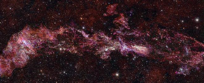 Largest ALMA image ever shows the molecular gas in the centre of the Milky Way (Credit: ALMA(ESO/NAOJ/NRAO)/S. Longmore et al. Background: ESO/D. Minniti et al.)