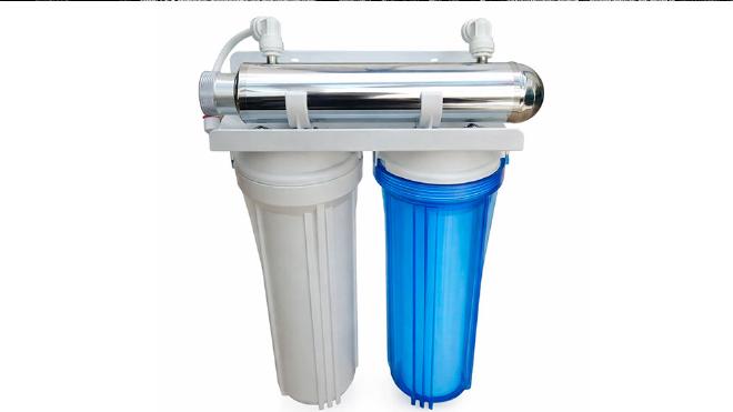 Schematic of a drinking water purification system that combines UVC photolysis and capture using adsorbent materials. Image courtesy of di Luca et al.