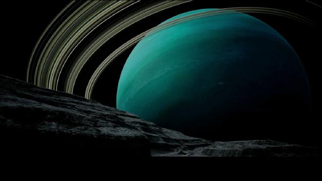 Uranus appears beyond the horizon of its moon Miranda in this illustration. If detectable, high-energy neutral particles produced near Uranus could help scientists decipher the structure and dynamics of the icy planet’s magnetosphere. Credit: NASA’s Goddard Space Flight Center Conceptual Image Lab