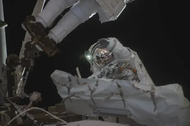 NASA astronaut Jessica Meir waves at the camera during a seven-hour, two-minute spacewalk outside the International Space Station on March 18, 2026. Image credit: NASA