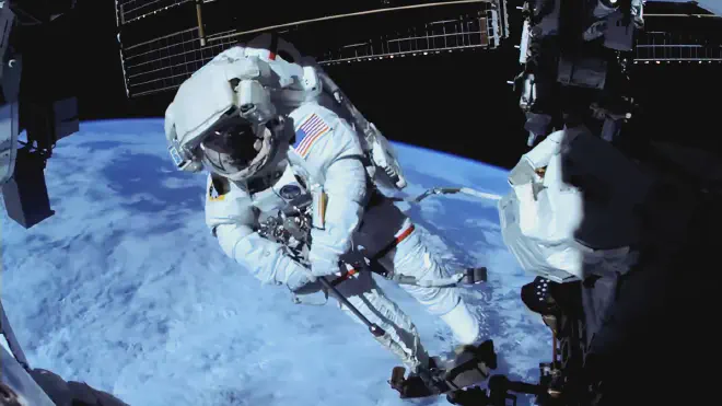 NASA astronaut Chris Williams conducted a spacewalk 260 miles above Earth on June 30, 2026, to repair the Canadarm2 robotic arm on the International Space Station. Image credit: NASA+