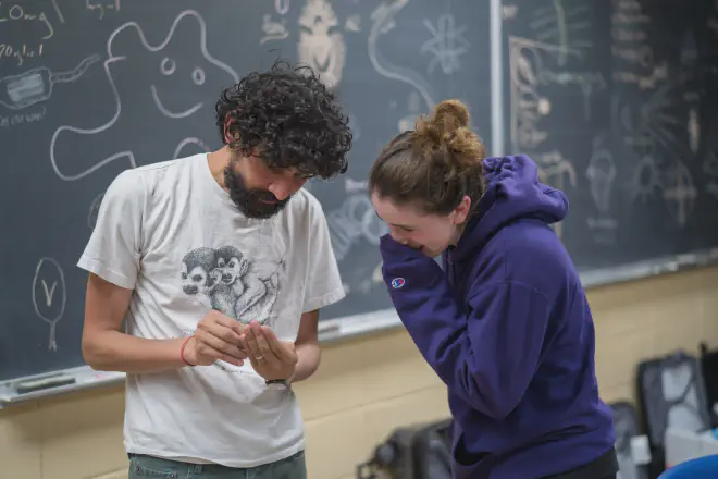 Prakash (left) and Flaum working on field samples at the Puerto Rico Field station on Isla Margueis. | Hongquan Li, Prakash Lab